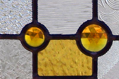 Closeup of stained and leaded glass abstract window