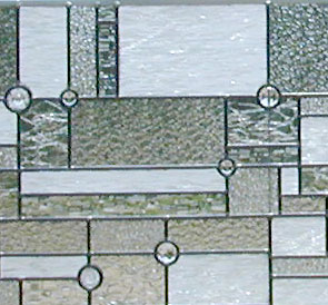 Closeup of custom abstract FLW leaded glass window